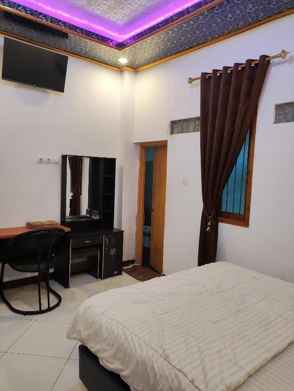 Penginapan Nurmega jaya - Chambre Double