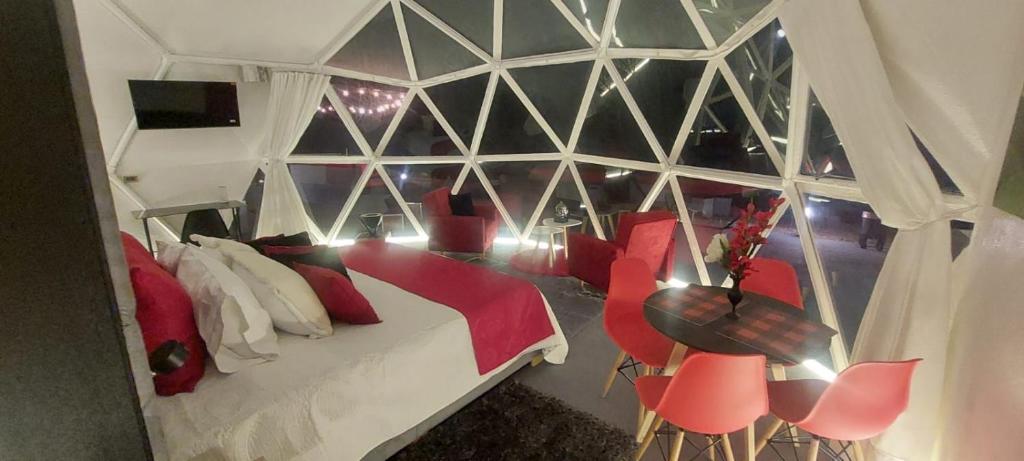 Postel nebo postele na pokoji v ubytování Monarca Azul Glamping