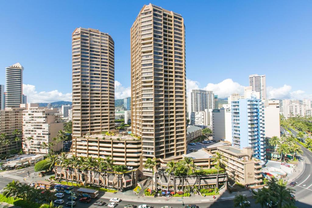 an aerial view of a city with tall buildings at Ilikai Tower 1403 City View 1BR in Honolulu