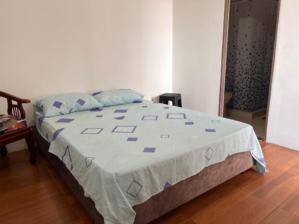 Postel nebo postele na pokoji v ubytování Epifania Hostel