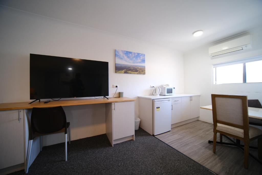 Kuchyň nebo kuchyňský kout v ubytování Lakeside Inn Wollongong