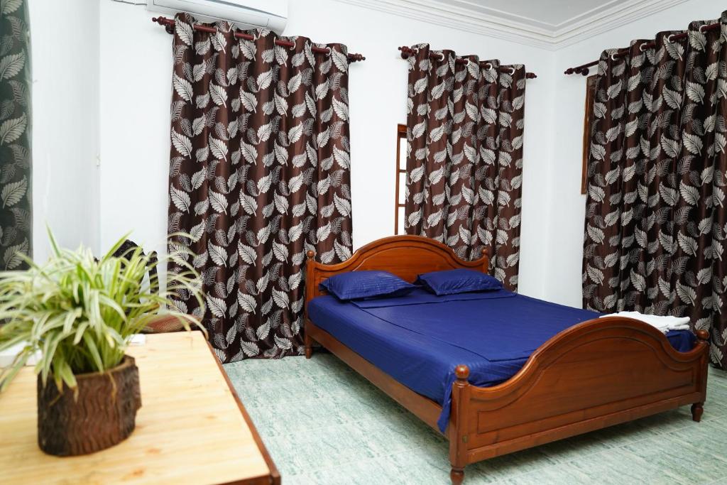 Postel nebo postele na pokoji v ubytování The Anam Hotel - Wellawatte