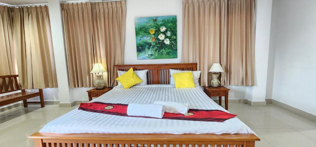 Postel nebo postele na pokoji v ubytování Royal Sweet Hotel