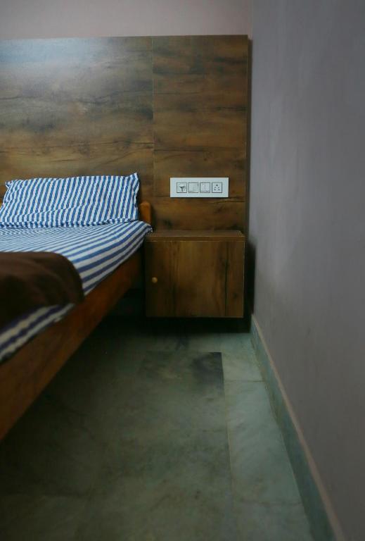 Postel nebo postele na pokoji v ubytování Chakalakkal Residency