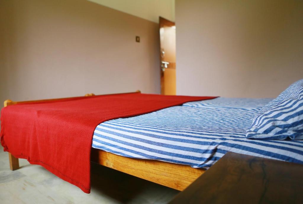Postel nebo postele na pokoji v ubytování Chakalakkal Residency