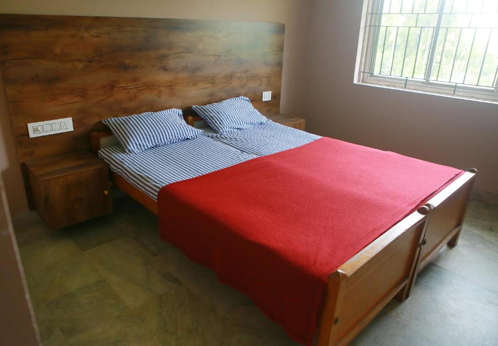 Postel nebo postele na pokoji v ubytování Chakalakkal Residency