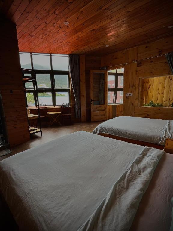 Voodi või voodid majutusasutuse Little Home Homestay toas