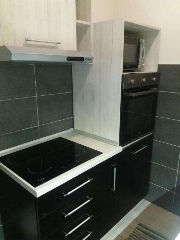 Kuchyň nebo kuchyňský kout v ubytování Bianco nero appartamento