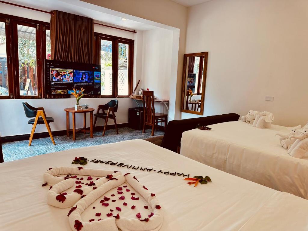 Giường trong phòng chung tại Vida Loca Sunset Beach Resort