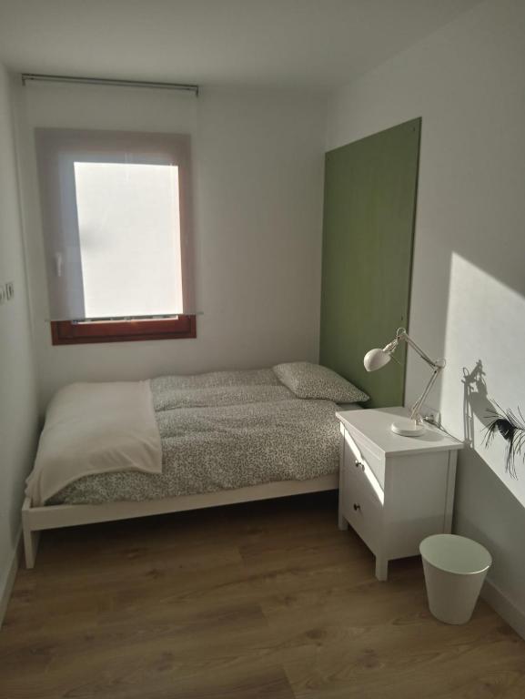Postel nebo postele na pokoji v ubytování Com a casa