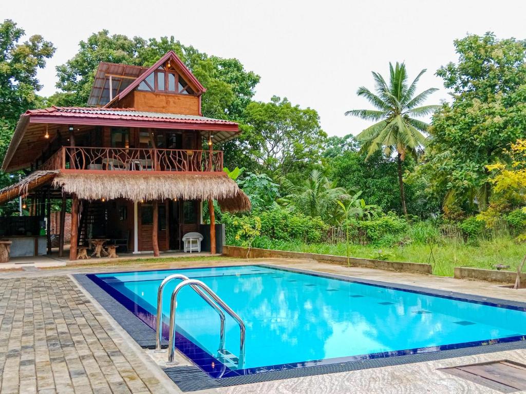 Bazén v ubytování Sigiriya Elegant Resort nebo v jeho okolí