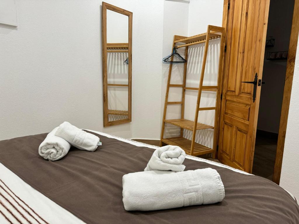Postel nebo postele na pokoji v ubytování Noches de Córdoba
