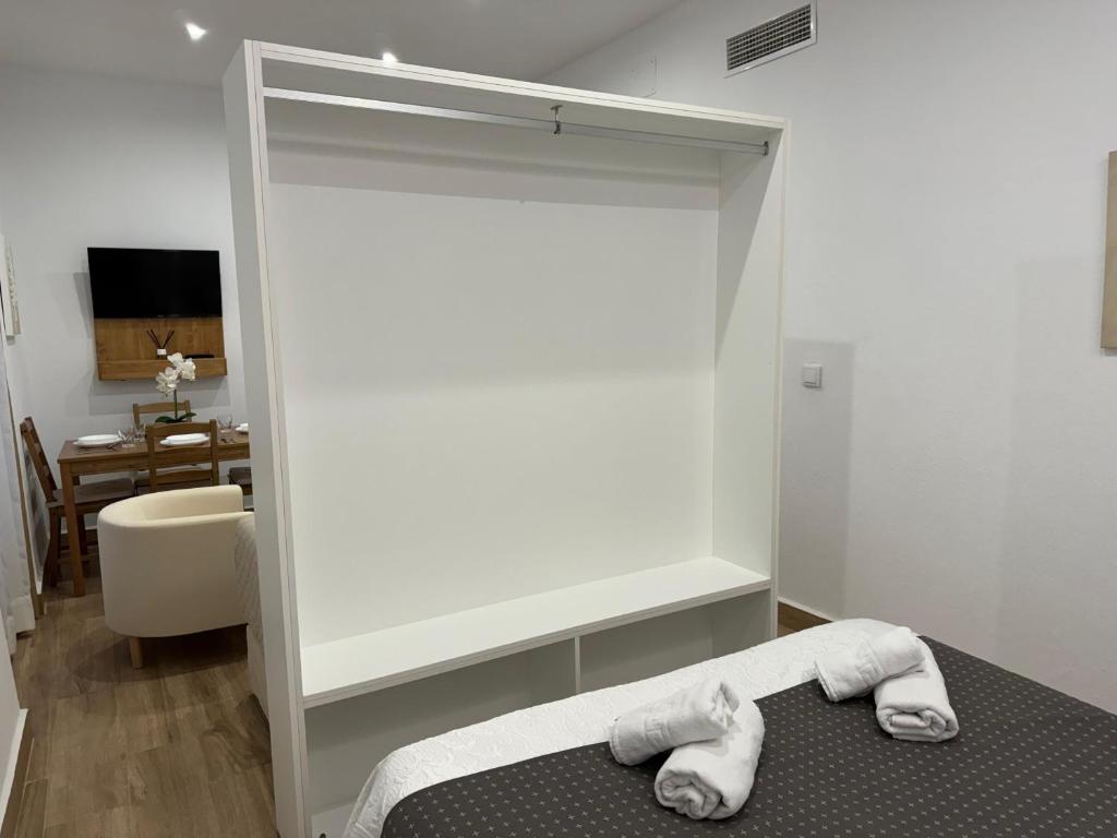 Postel nebo postele na pokoji v ubytování Noches de Córdoba