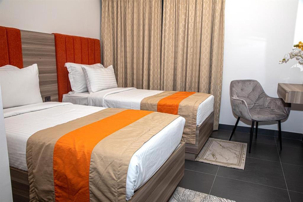 Postel nebo postele na pokoji v ubytování Wescott Hotel