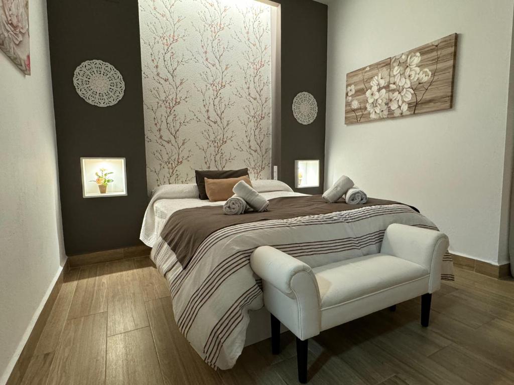 Postel nebo postele na pokoji v ubytování Noches de Córdoba