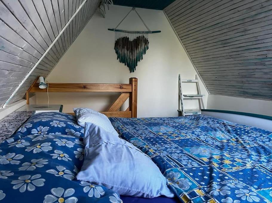 Postel nebo postele na pokoji v ubytování Chata se zahradou v Liberci