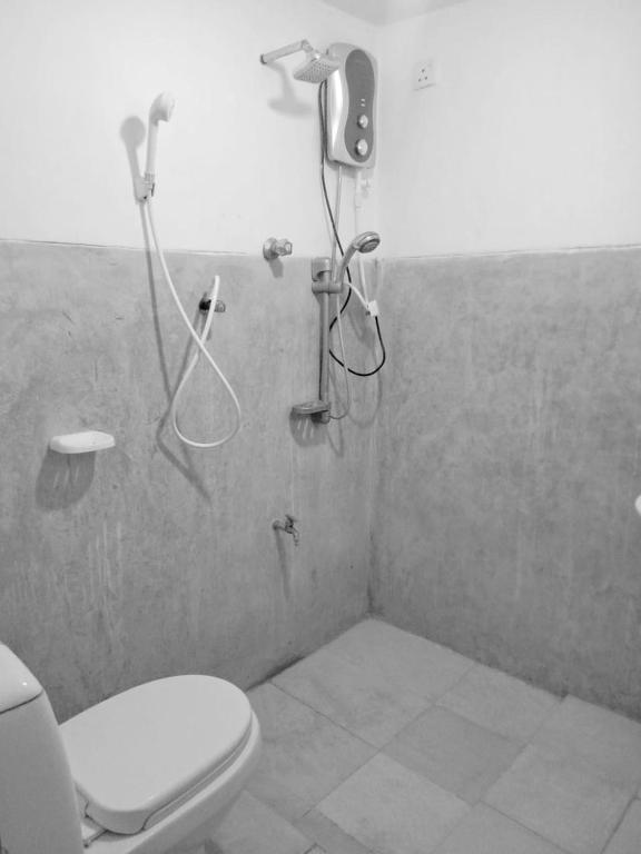 Koupelna v ubytování Arachchi Guest House