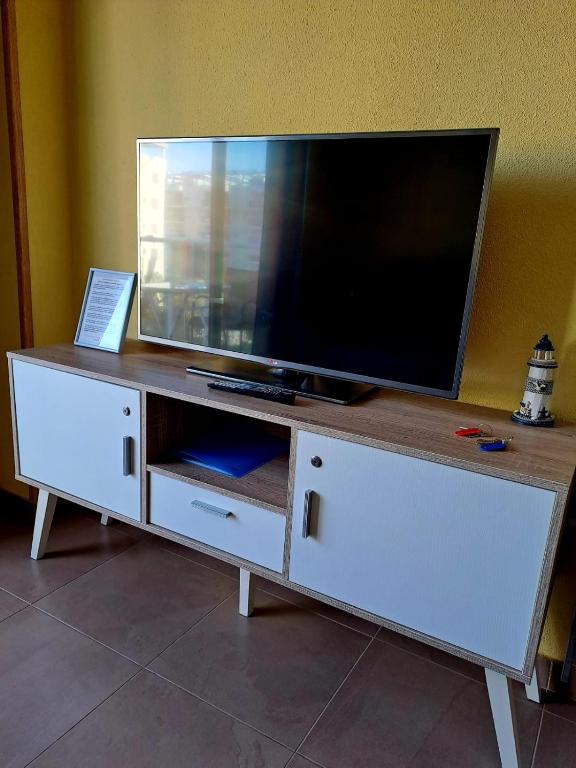 TV a/nebo společenská místnost v ubytování Romántico Daimús 2