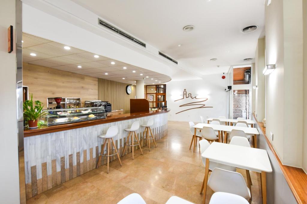 Kuchyň nebo kuchyňský kout v ubytování Hotel Nadal