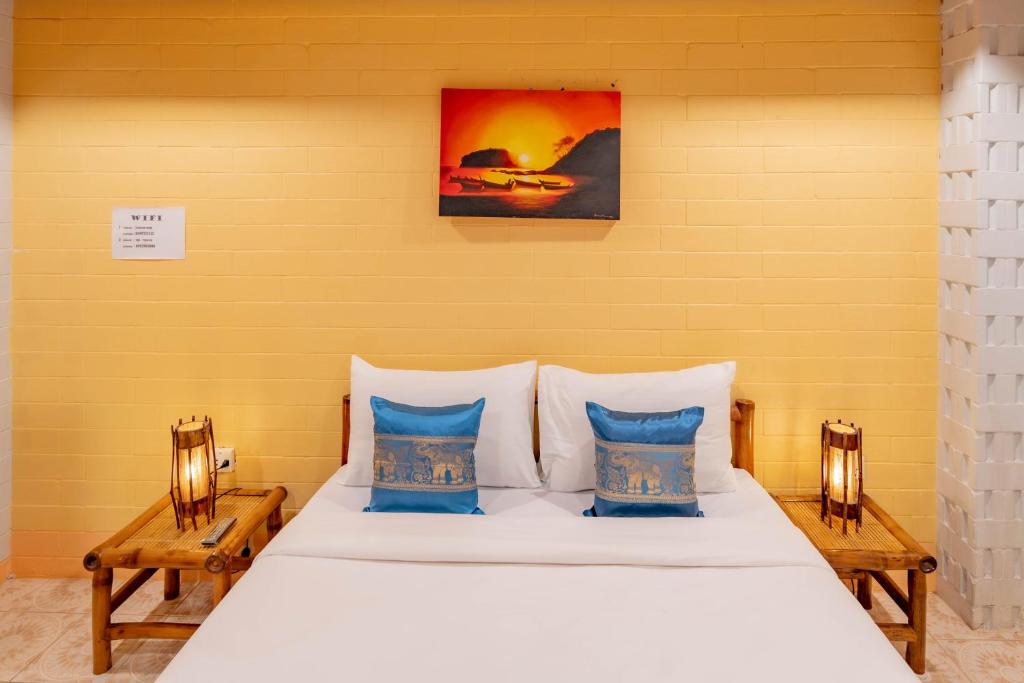 Postel nebo postele na pokoji v ubytování Lightplus Khao Lak