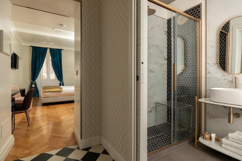 Koupelna v ubytování Hotel Mozart