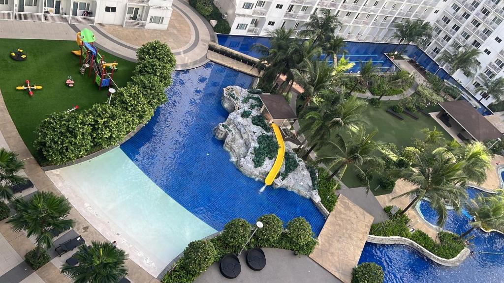 an overhead view of a swimming pool in a resort at 4Brother's Staycation by Jessika in Manila