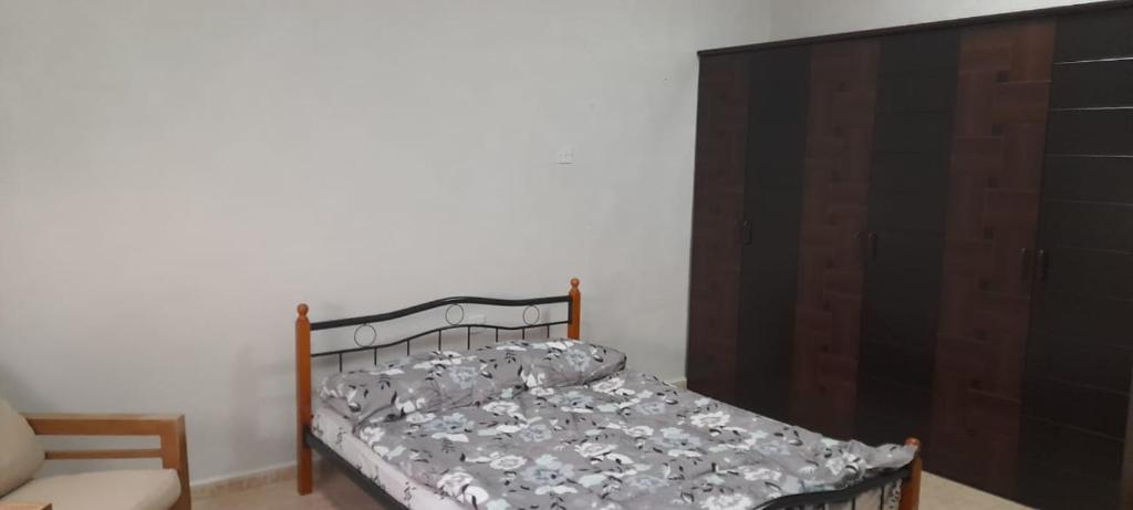 Postel nebo postele na pokoji v ubytování HOUSE IN AL AIN