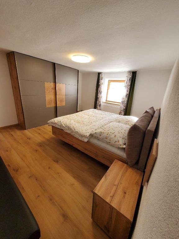 Postel nebo postele na pokoji v ubytování Rosa's Ferienhaus Ferienwohnung Aggenstein