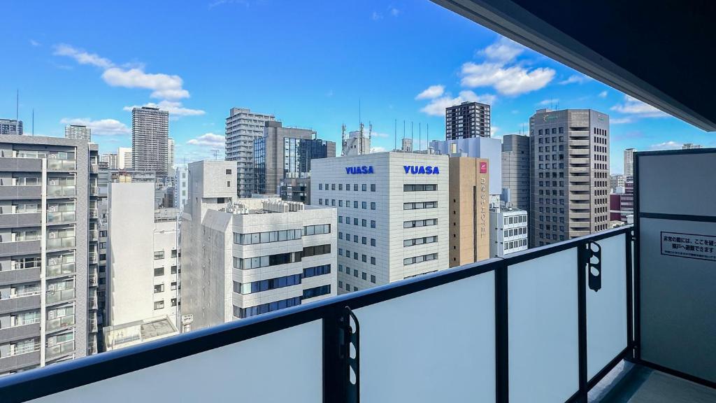 Balkón nebo terasa v ubytování Apartment Hotel 11 Shinsaibashi 3