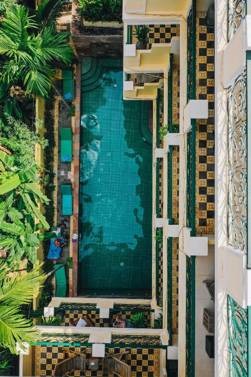 an overhead view of a swimming pool at a resort at GOLDEN BANANA Residence in Siem Reap