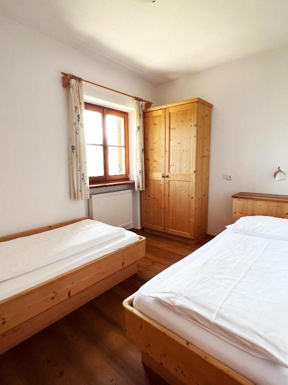 Postel nebo postele na pokoji v ubytování Gasserhof