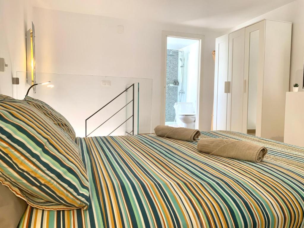 A bed or beds in a room at Dream Holiday Las Americas