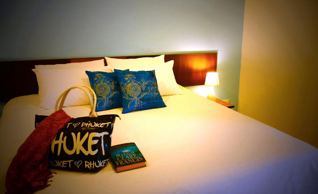Postel nebo postele na pokoji v ubytování Cool Residence Hotel