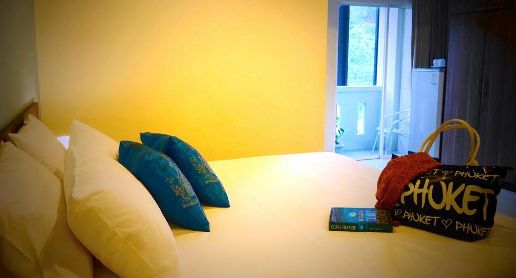 Postel nebo postele na pokoji v ubytování Cool Residence Hotel