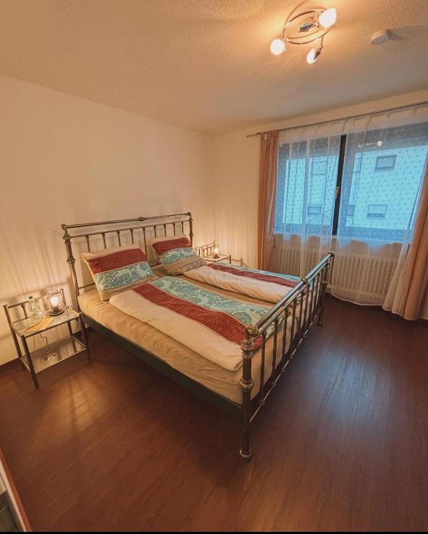 Postel nebo postele na pokoji v ubytování Ferienwohnung in der fränkischen Schweiz