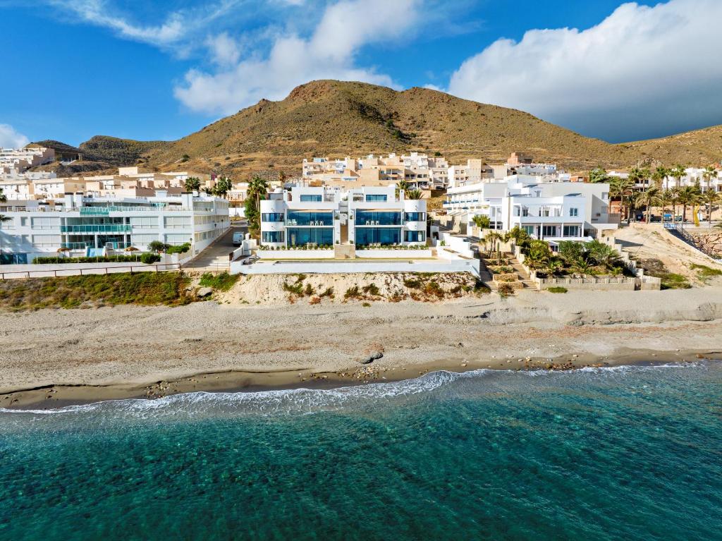 an aerial view of a resort on the beach at CasaCarbonito in Carboneras