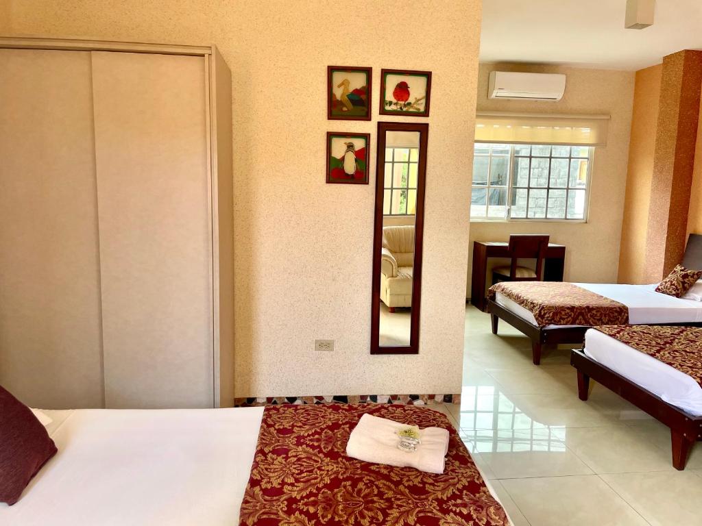 Postel nebo postele na pokoji v ubytování Eco Hotel Katarma