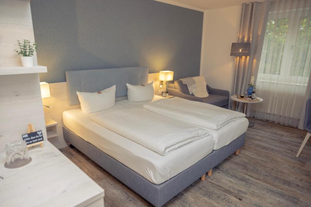Postel nebo postele na pokoji v ubytování C-YOU Hotel Chemnitz