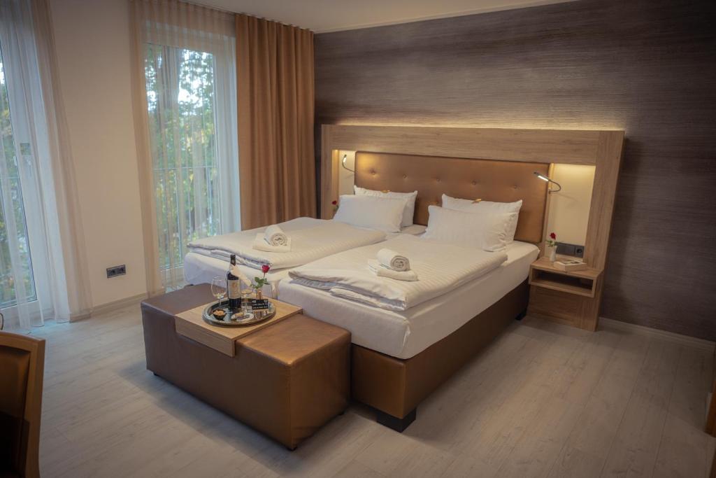 Postel nebo postele na pokoji v ubytování C-YOU Hotel Chemnitz
