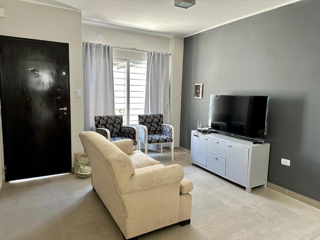 TV a/nebo společenská místnost v ubytování DUPLEX QUICHI