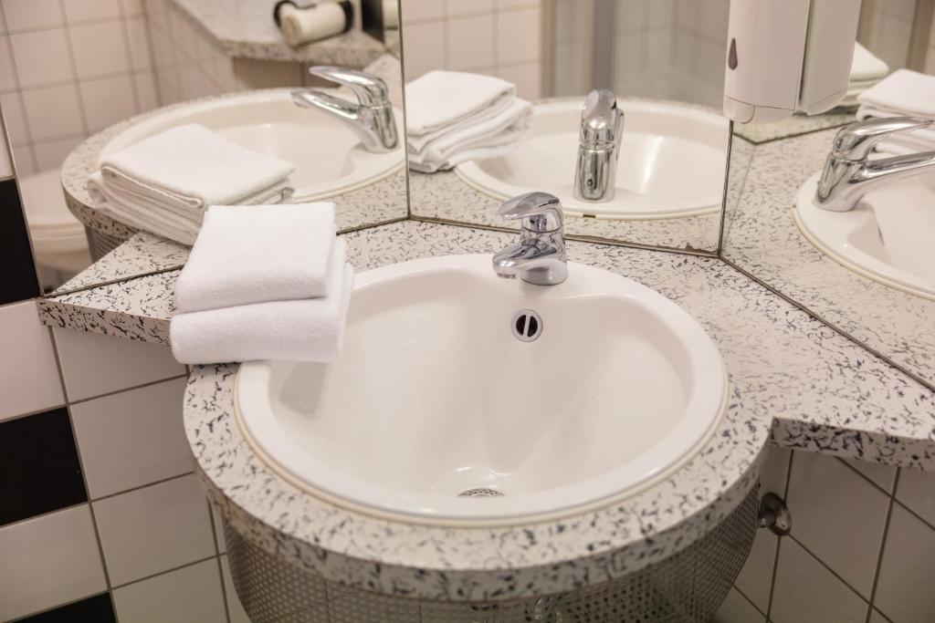 Koupelna v ubytování C-YOU Hotel Chemnitz