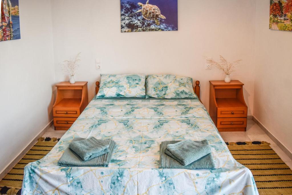 Кровать или кровати в номере Nest View House