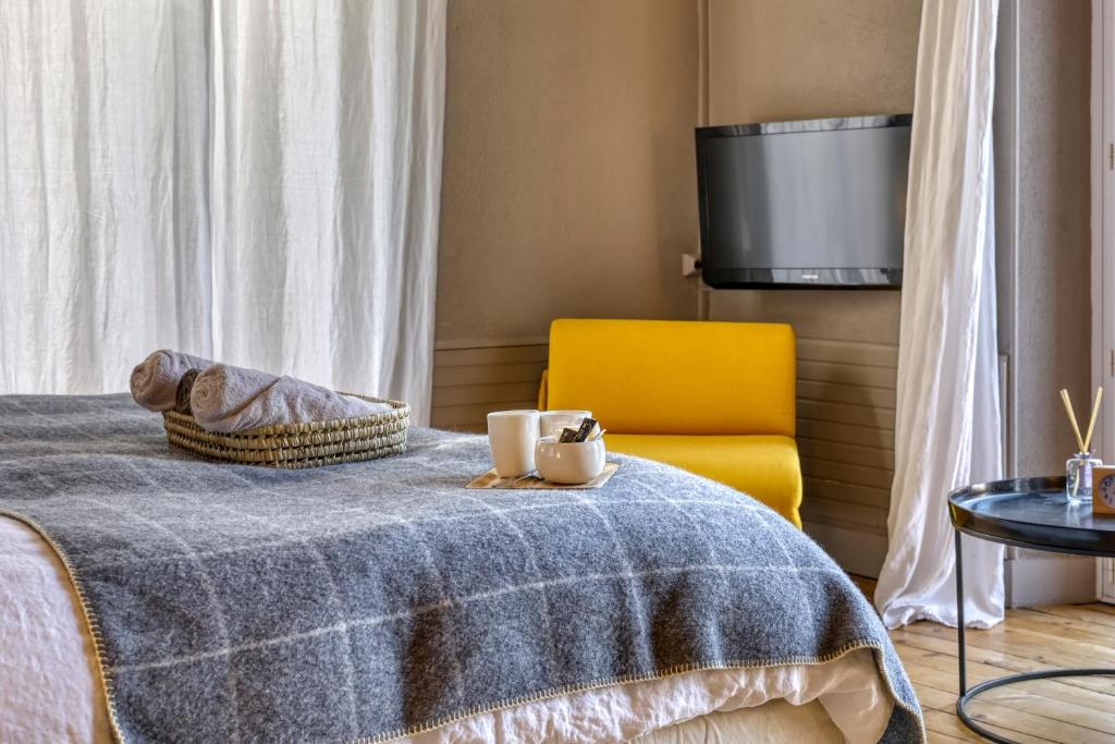 Postel nebo postele na pokoji v ubytování Chalet Hotel La Féline Blanche