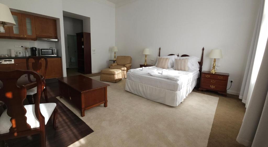 Posteľ alebo postele v izbe v ubytovaní OPERA16 Guestrooms