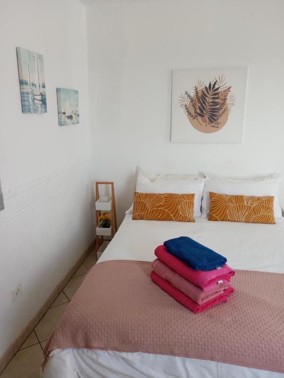 Łóżko lub łóżka w pokoju w obiekcie Apartamento Te Miti