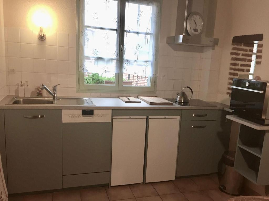 Kuchyň nebo kuchyňský kout v ubytování Chambres et Table d'hôtes Cerviña