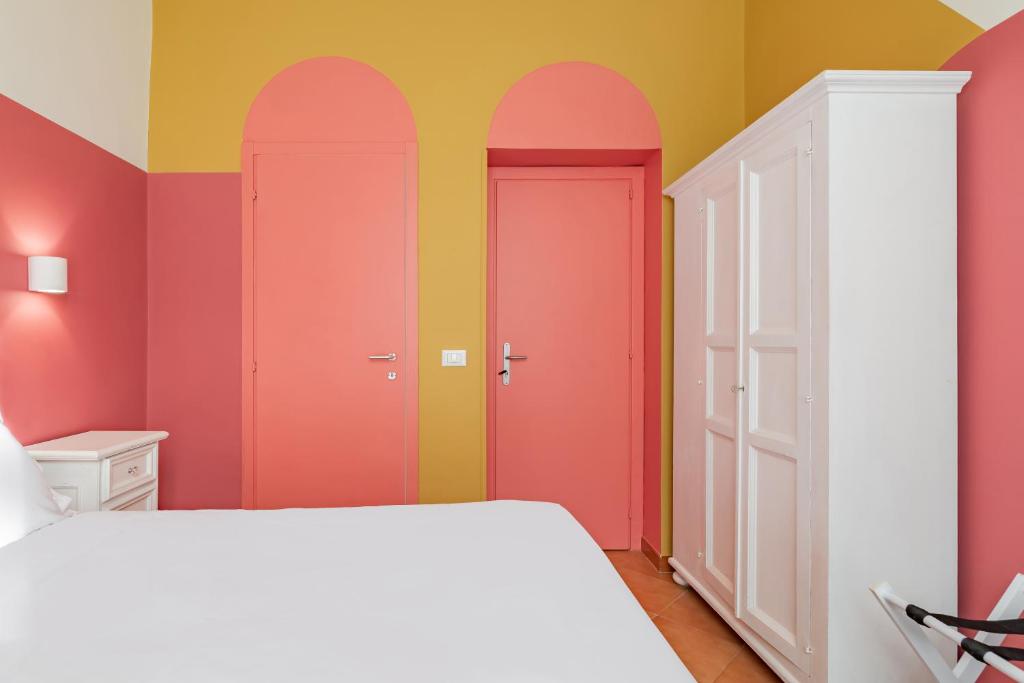 Postel nebo postele na pokoji v ubytování Hotel Infinito - Gruppo BLAM HOTELS