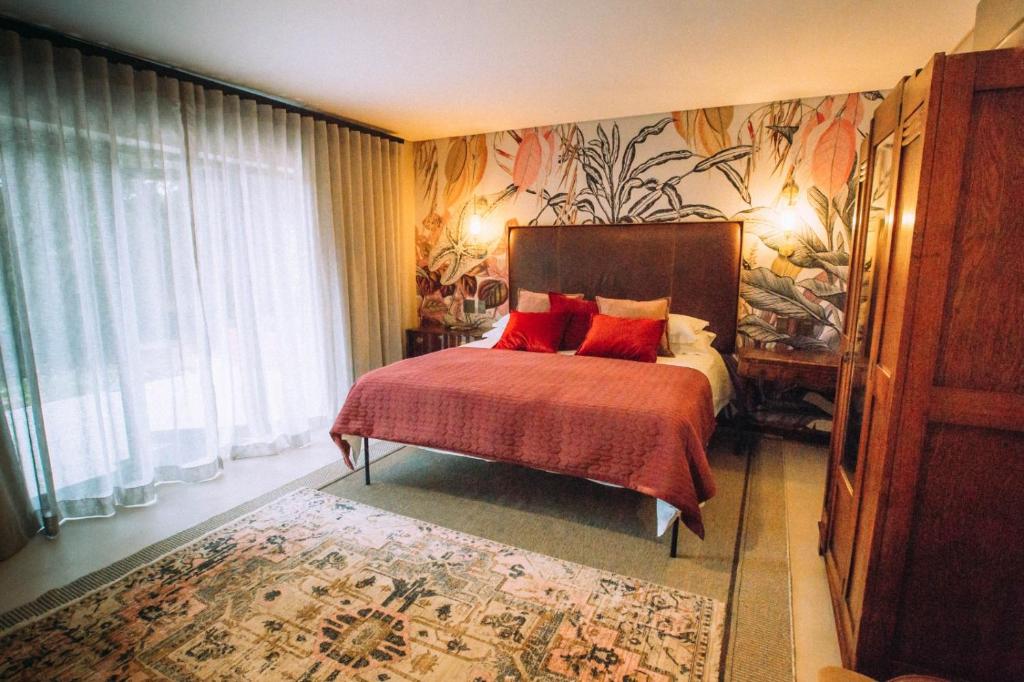 Postel nebo postele na pokoji v ubytování The Bohemian Guesthouse