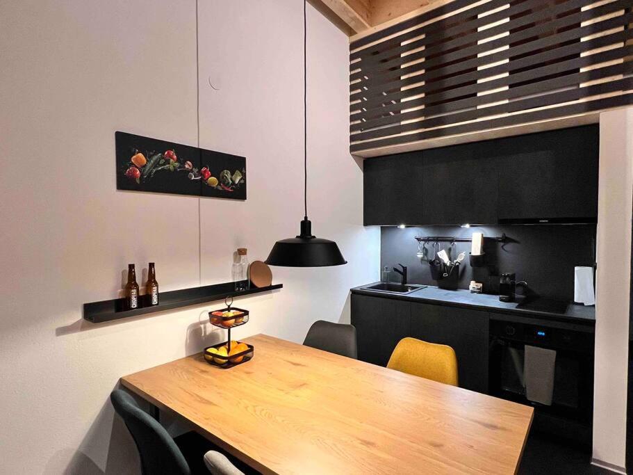Kuchyň nebo kuchyňský kout v ubytování studio suite im fresh-cube
