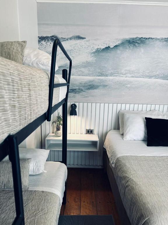 Postel nebo postele na pokoji v ubytování Yogi hostels